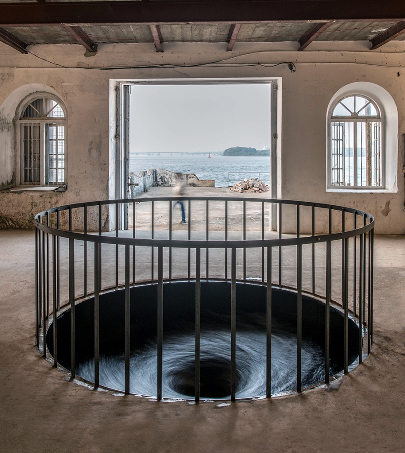 Illustration for article titled You Can See an Endless Water Vortex Beneath This Floor